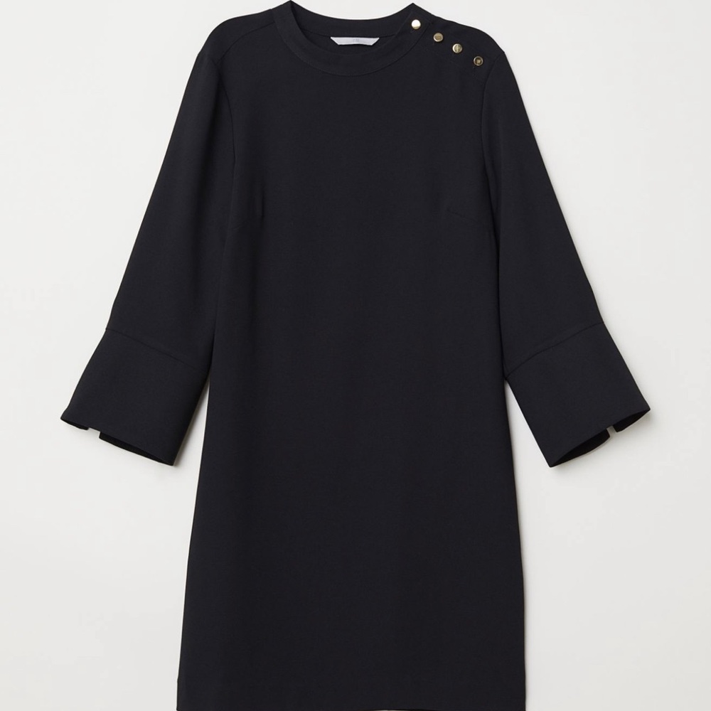 Black shift dress detailed with gold buttons